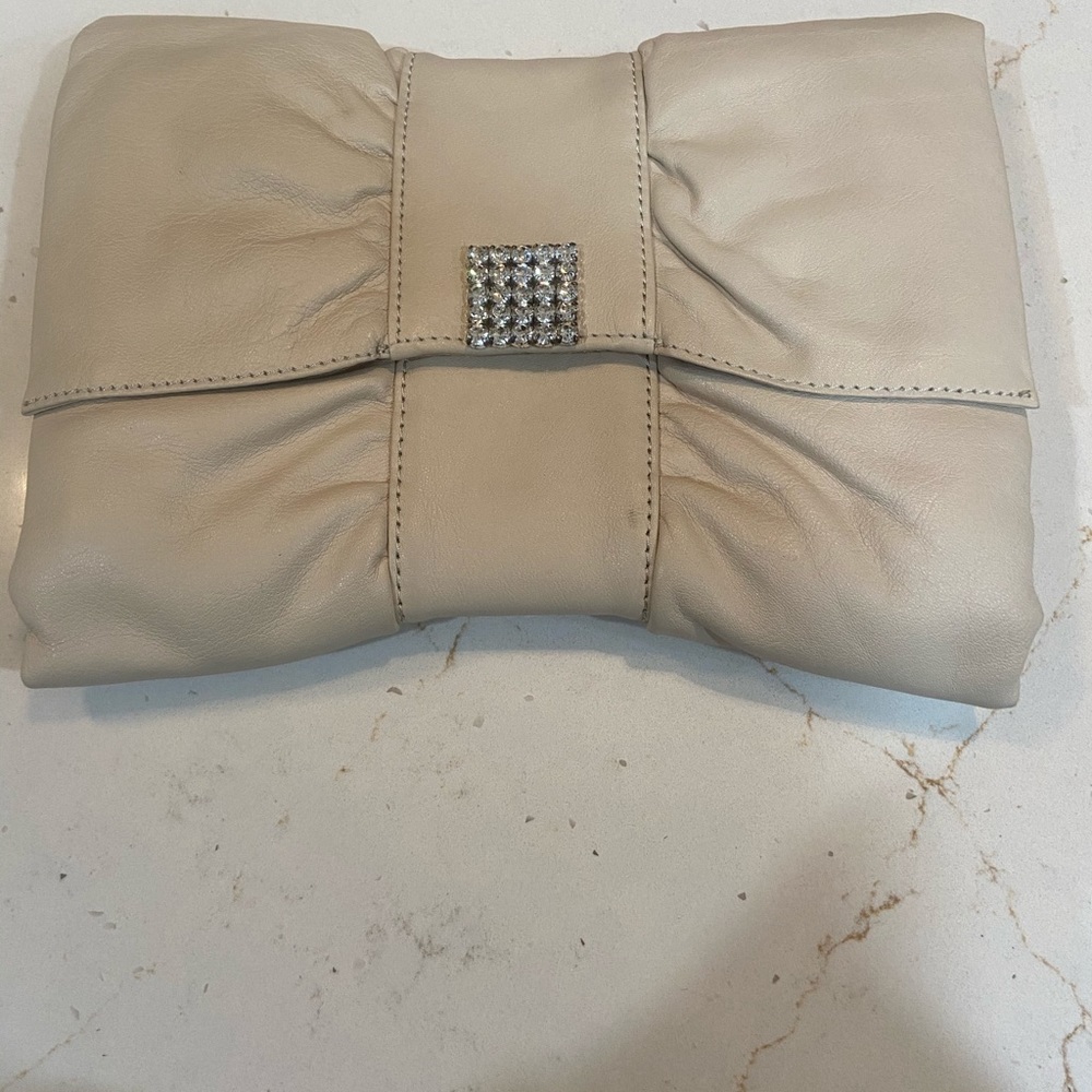 Clutch with embellishment